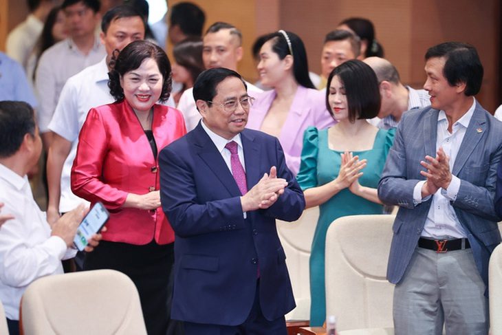 4 lần liên tiếp giảm lãi suất điều hành, mặt bằng lãi suất thị trường đã giảm - Ảnh 1. Thủ tướng Phạm Minh Chính đến dự Hội nghị sơ kết hoạt động ngân hàng 6 tháng đầu năm - Ảnh: VGP